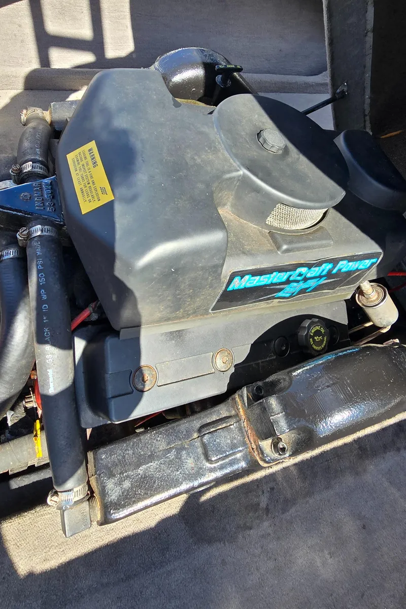 Slide: The Image of 1996 MasterCraft Prostar 205 engine, showcasing detailed components and branding. - 17