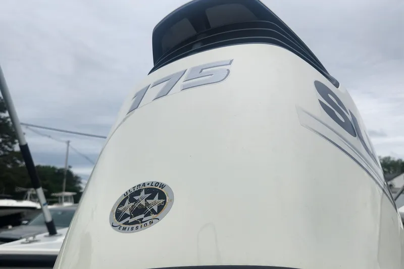 Slide: The Image of Close-up of a 2019 NorthCoast 215 Cabin boat engine with 175 horsepower. - 6
