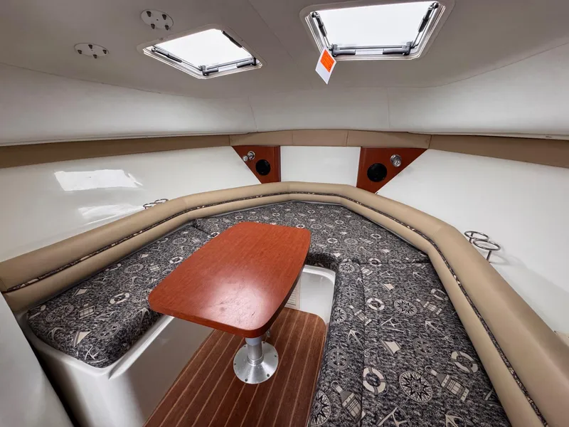 Slide: The Image of 2006 Pro-Line 32 Express cabin interior with seating and table. - 17