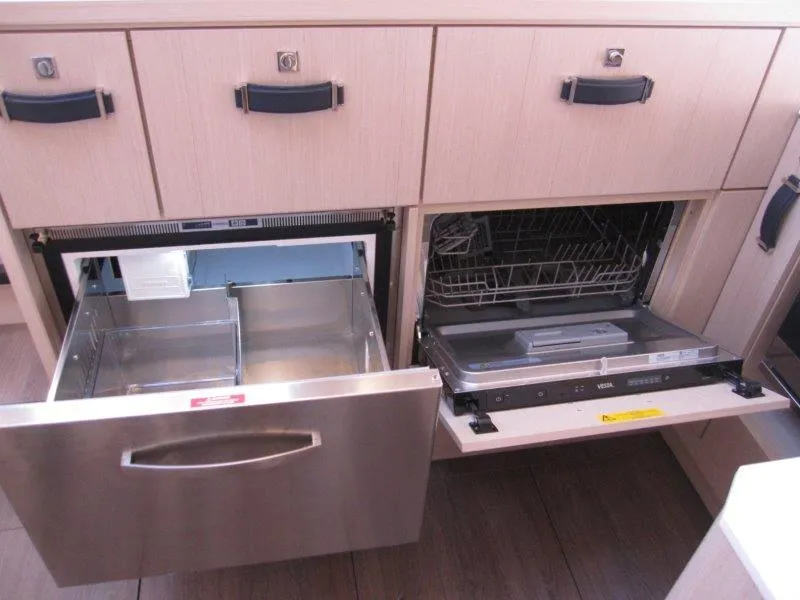 Slide: The Image of Modern kitchen appliances in Jeanneau 60 yacht, 2024 model. - 22
