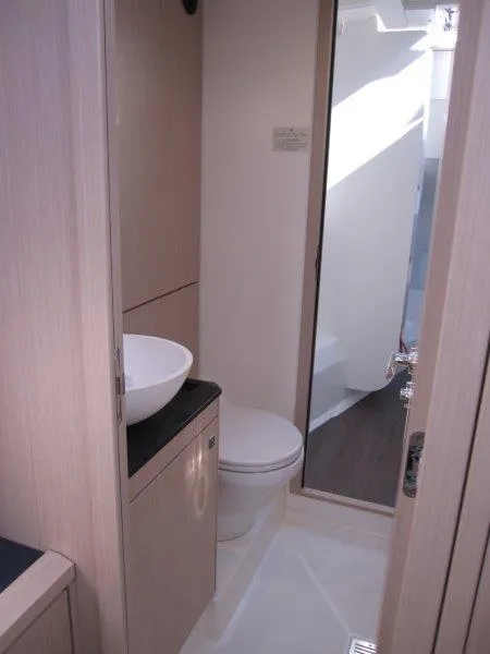 Slide: The Image of 2024 Jeanneau 60 yacht bathroom with modern fixtures and sleek design. - 33