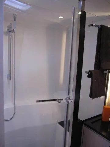 Slide: The Image of Modern bathroom in 2024 Jeanneau 55 yacht with sleek shower and contemporary fixtures. - 20