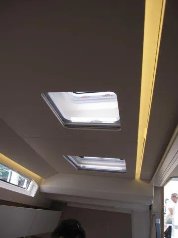 Slide: The Image of Interior ceiling view of 2024 Jeanneau 55 yacht with skylights. - 49