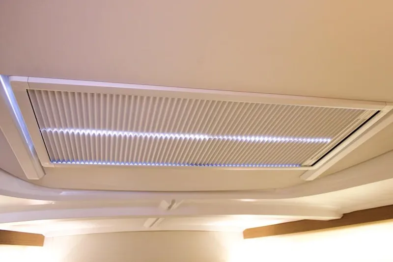 Slide: The Image of Ceiling vent with LED lighting in 2024 Jeanneau Sun Odyssey 490 yacht. - 7
