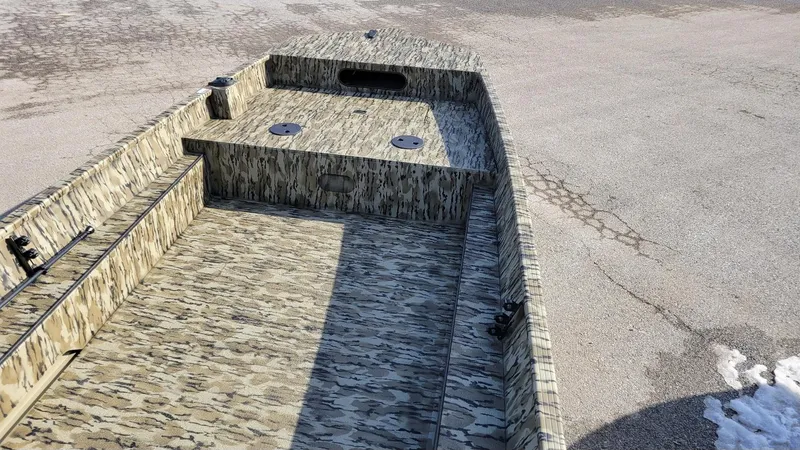 Slide: The Image of 2025 Smoker Craft Sportsman 1866 camo boat, spacious interior, durable design. - 12