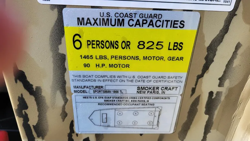 Slide: The Image of 2025 Smoker Craft Sportsman 1866 tiller camo boat capacity label, 6 persons or 825 lbs. - 15