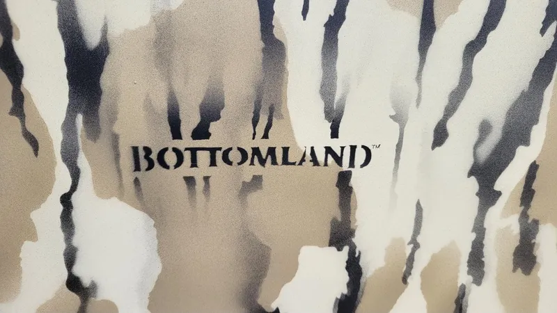 Slide: The Image of Camo pattern with "Bottomland" text on Smoker Craft Sportsman 1866 tiller, 2025 model. - 4