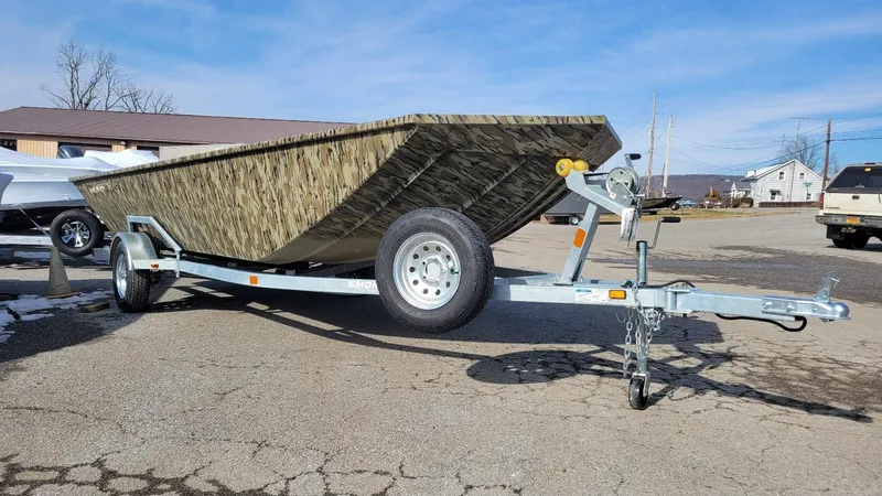 Slide: The Image of 2025 Smoker Craft Sportsman 1866 camo boat on trailer, Yamaha 70 hp engine. - 5