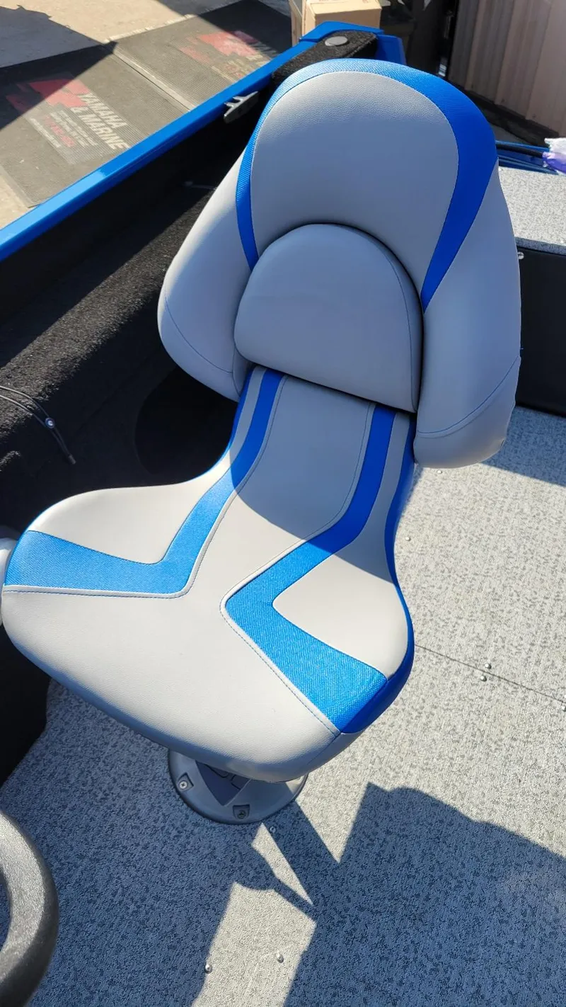 Slide: The Image of 2025 Smoker Craft Lazer 161 side console boat seat, gray with blue accents. - 7