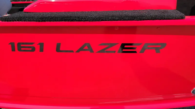 Slide: The Image of 2025 Smoker Craft Lazer 161 side console, vibrant red exterior, in stock. - 3