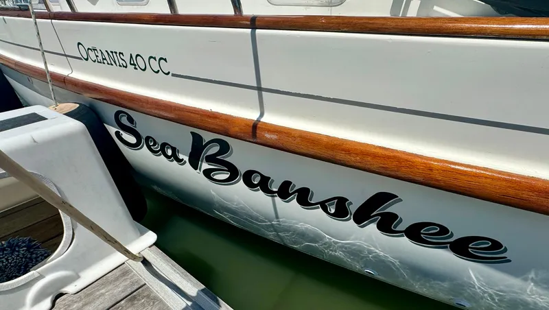 Slide: The Image of Beneteau Oceanis 40 CC sailboat, 1996, named Sea Banshee, docked at marina. - 28