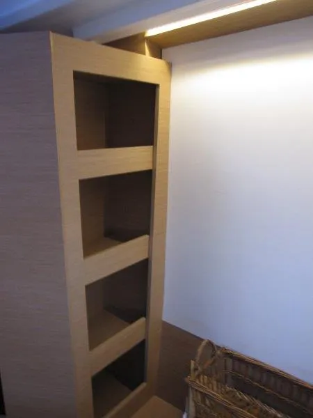 Slide: The Image of 2024 Jeanneau 380 interior shelving unit with modern design. - 24