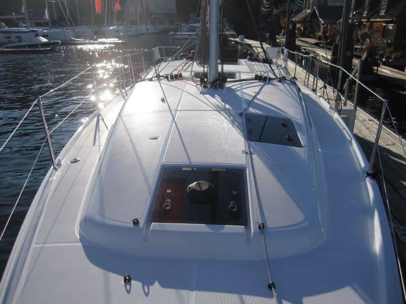 Slide: The Image of 2024 Jeanneau 380 sailboat deck at marina. - 48