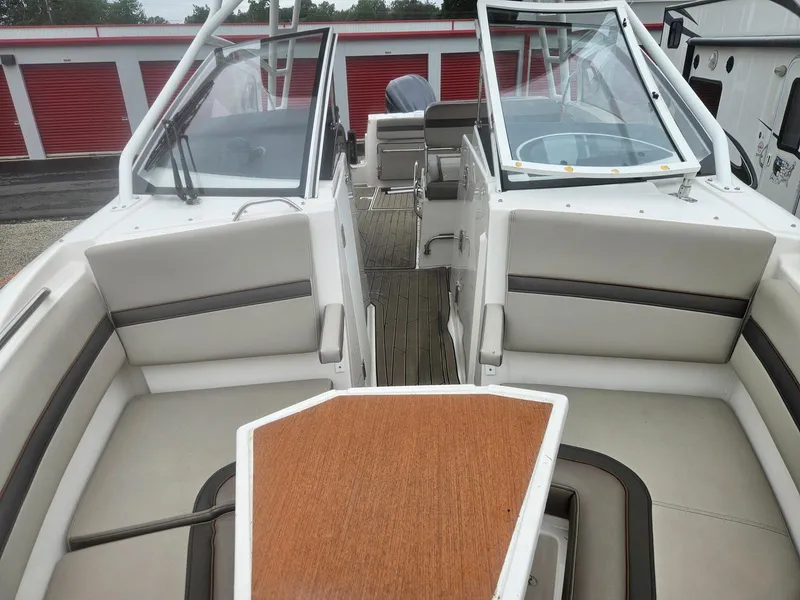 Slide: The Image of 2021 Cutwater C-24 DC boat interior with seating and table. - 10