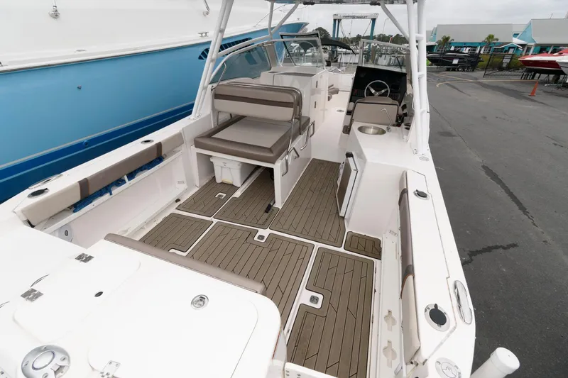 Slide: The Image of 2021 Cutwater C-24 DC boat interior with spacious seating and modern design. - 15