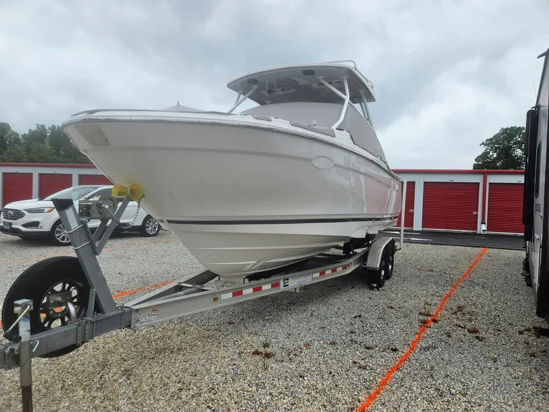 Slide: The Image of 2021 Cutwater C-24 DC boat on a trailer in a storage facility. - 4