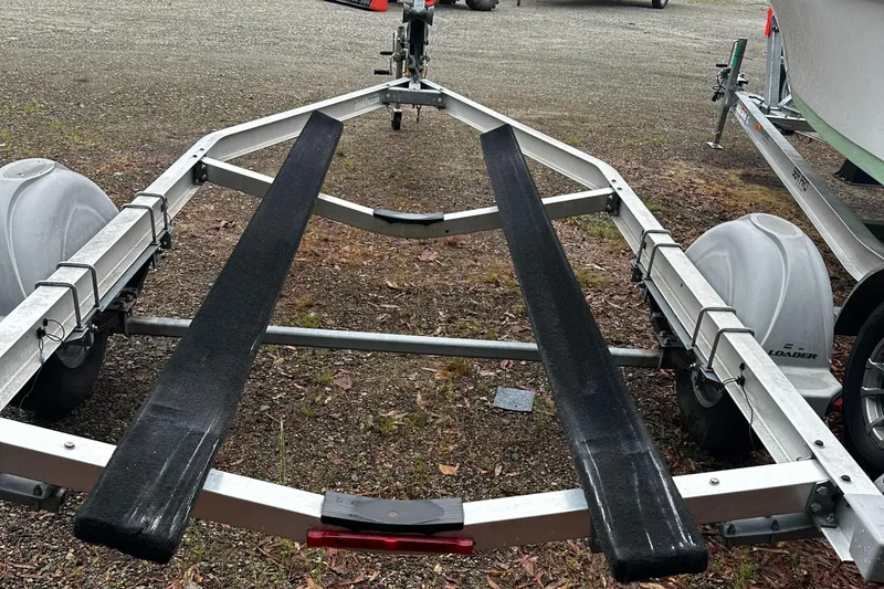 Slide: The Image of 2003 Novurania 530 DL boat trailer on gravel lot. - 5