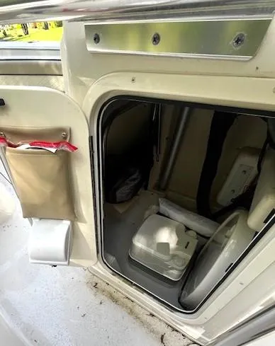 Slide: The Image of 2022 Sea Chaser 22 HFC boat interior with compact marine toilet. - 26