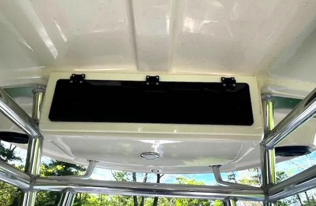 Slide: The Image of 2022 Sea Chaser 22 HFC boat interior with overhead storage compartment. - 31