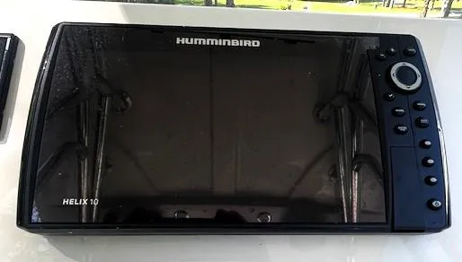 Slide: The Image of Humminbird Helix 10 fish finder on 2022 Sea Chaser 22 HFC boat dashboard. - 32