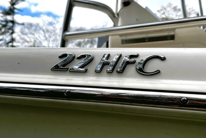 Slide: The Image of 2022 Sea Chaser 22 HFC boat emblem with chrome finish. - 8