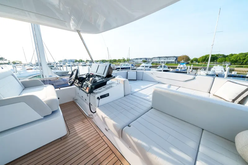 Slide: The Image of Luxurious 2024 Sirena 48 yacht interior with spacious seating and modern helm station. - 16