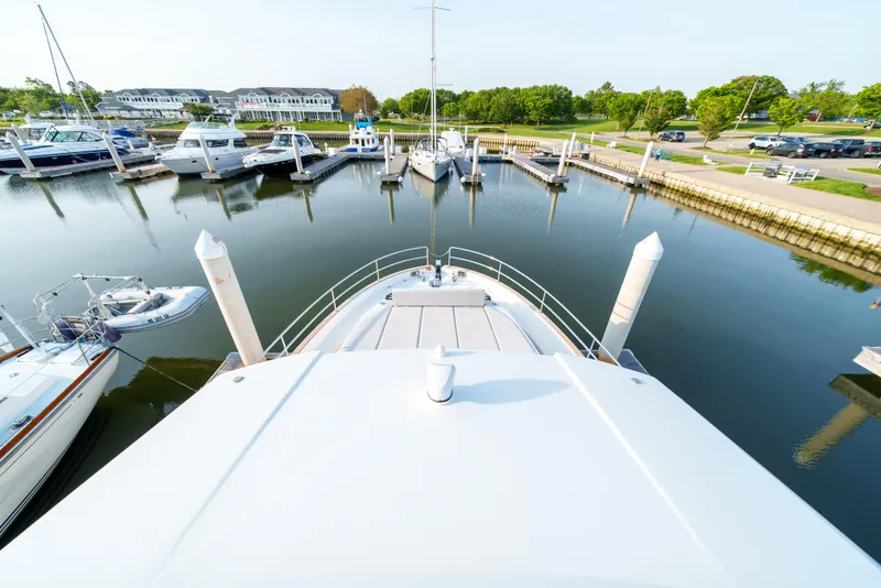 Slide: The Image of Bow view of 2024 Sirena 48 yacht docked at a marina. - 19