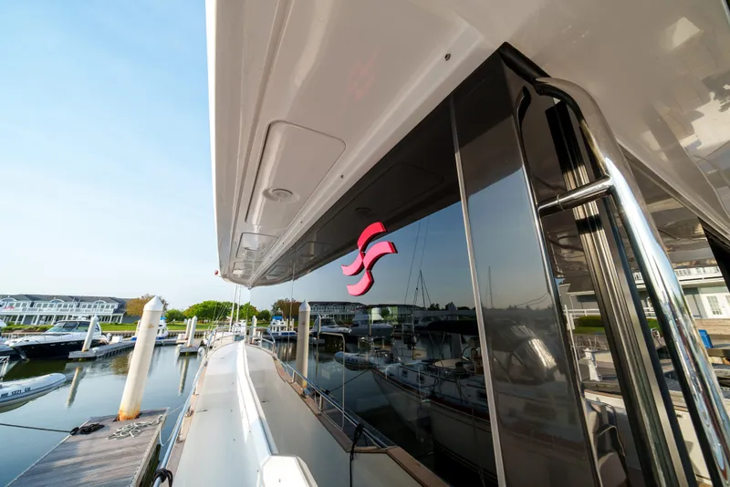Slide: The Image of 2024 Sirena 48 yacht docked at a marina. - 21