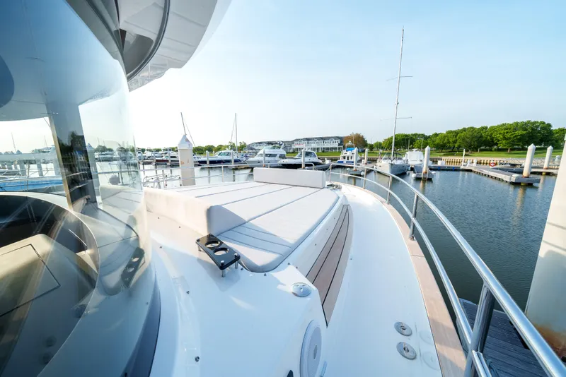 Slide: The Image of 2024 Sirena 48 yacht docked at a marina. - 22