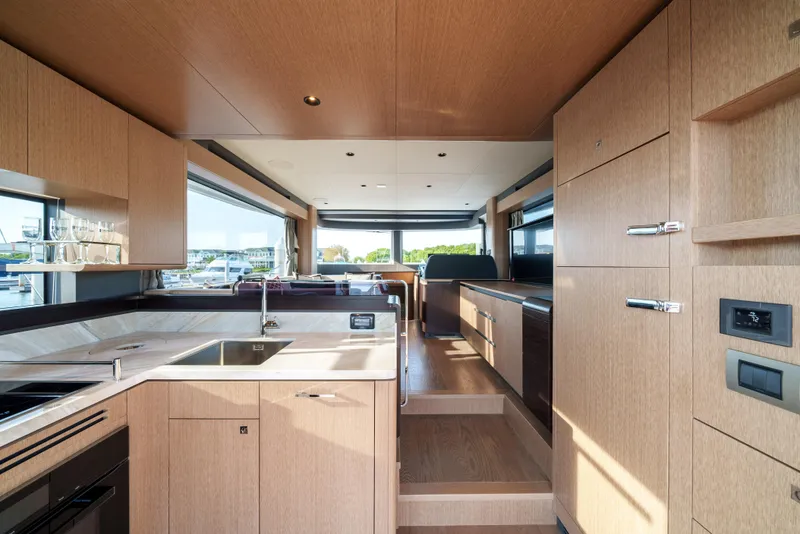 Slide: The Image of Modern interior of 2024 Sirena 48 yacht with spacious kitchen and dining area. - 29