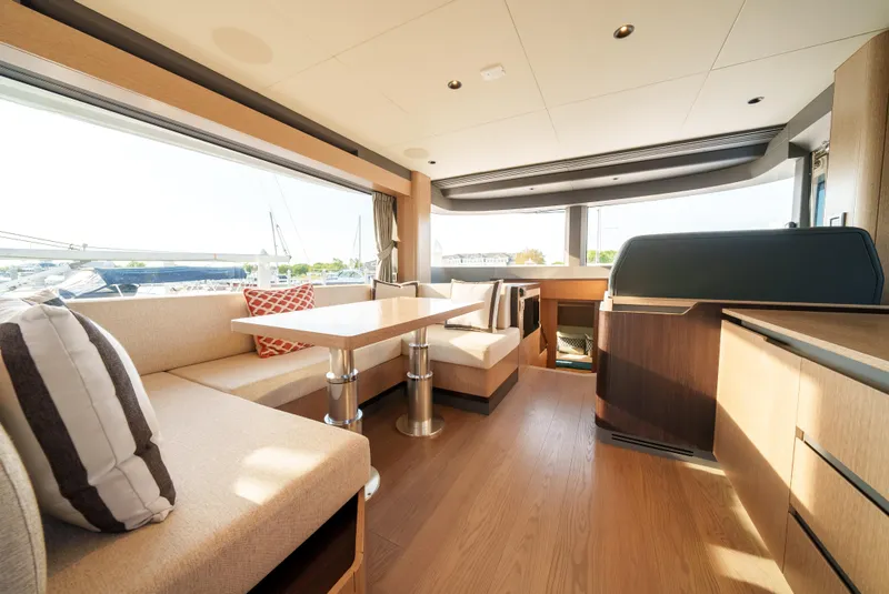 Slide: The Image of Interior of 2024 Sirena 48 yacht with modern seating and dining area. - 32