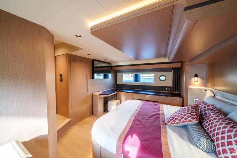 Slide: The Image of Luxurious bedroom interior of 2024 Sirena 48 yacht with modern design and ample natural light. - 41