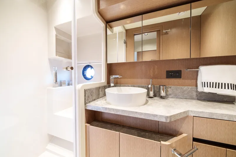 Slide: The Image of Modern bathroom in 2024 Sirena 48 yacht with sleek design and luxury fixtures. - 43