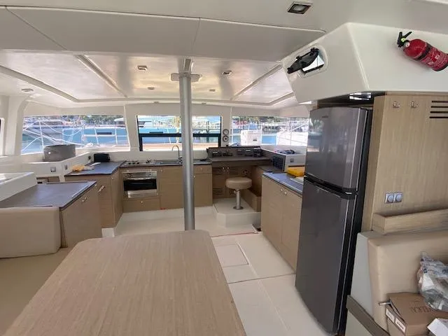 Slide: The Image of Modern bathroom in a 2017 Bali 4.0 yacht with sink, mirror, and storage. - 11