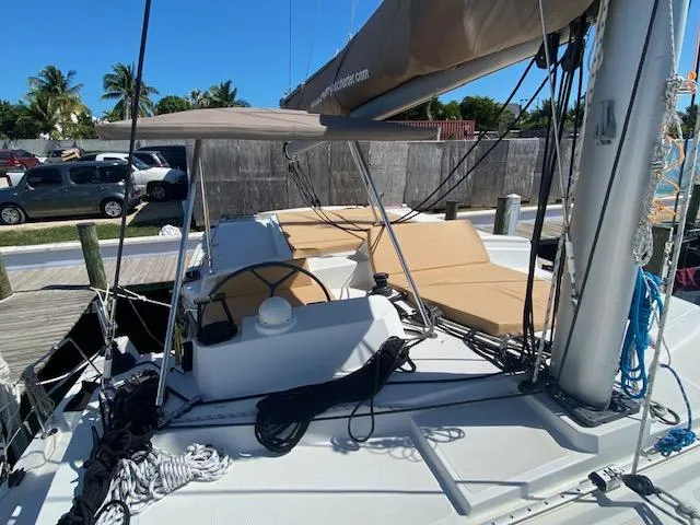 Slide: The Image of Cockpit of 2017 Bali 4.0 sailboat with steering wheel and navigation equipment. - 8