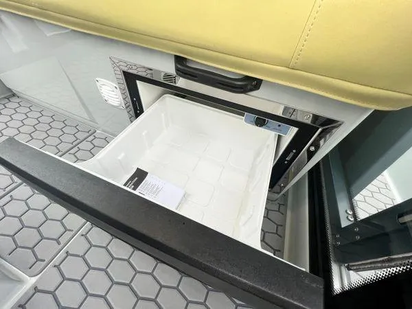 Slide: The Image of Built-in storage compartment in the 2024 XO Boats DFNDR 9. - 14