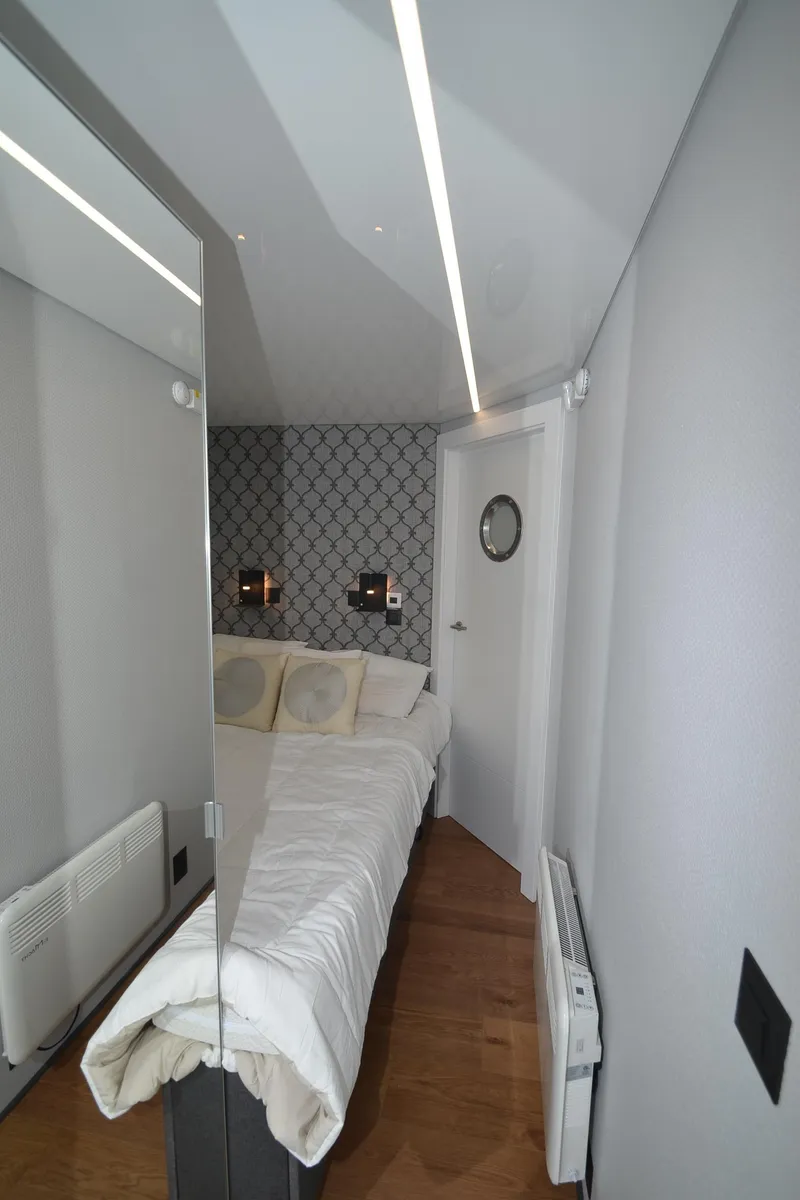 Slide: The Image of Modern 2024 La Mare Model 11 bedroom with sleek design and geometric wallpaper. - 28