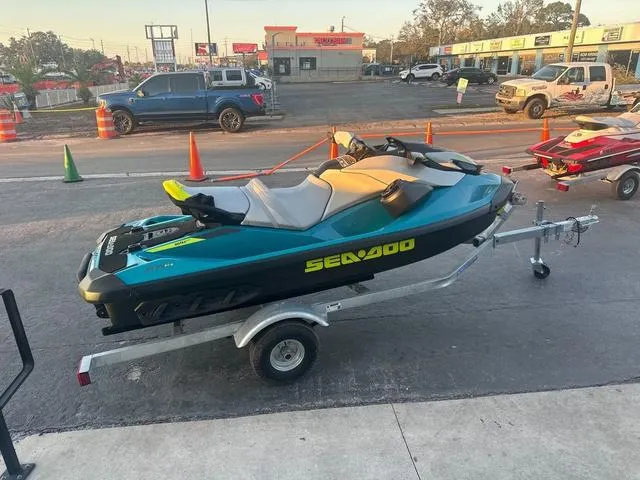 Slide: The Image of 2024 Sea-Doo GTI Waverunner on trailer in parking lot. - 6