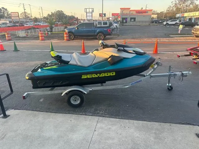 Slide: The Image of 2024 Sea-Doo Waverunner GTI on trailer in urban setting. - 8