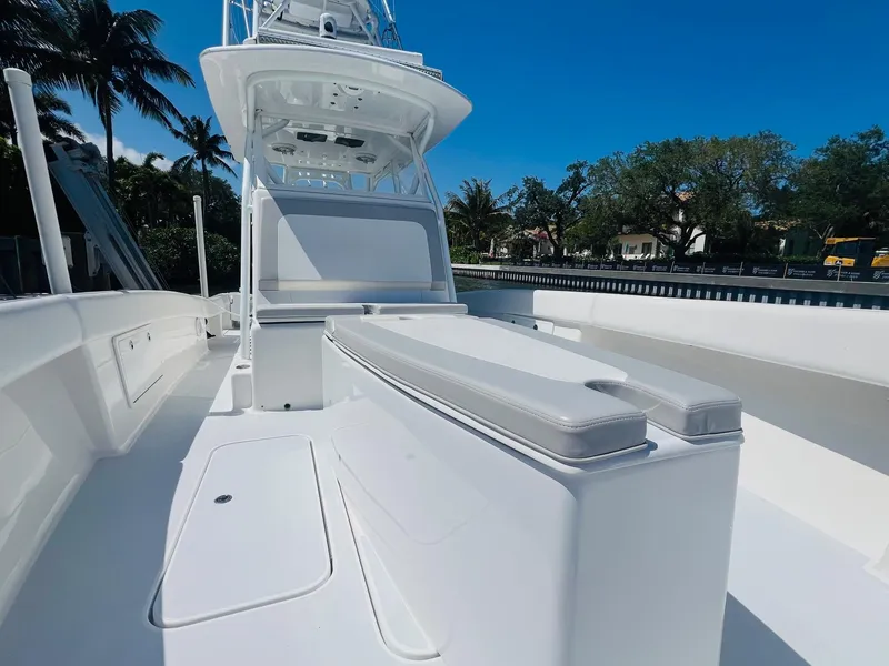 Slide: The Image of 2015 Billfish 39 Custom CC boat with spacious deck and seating. - 27