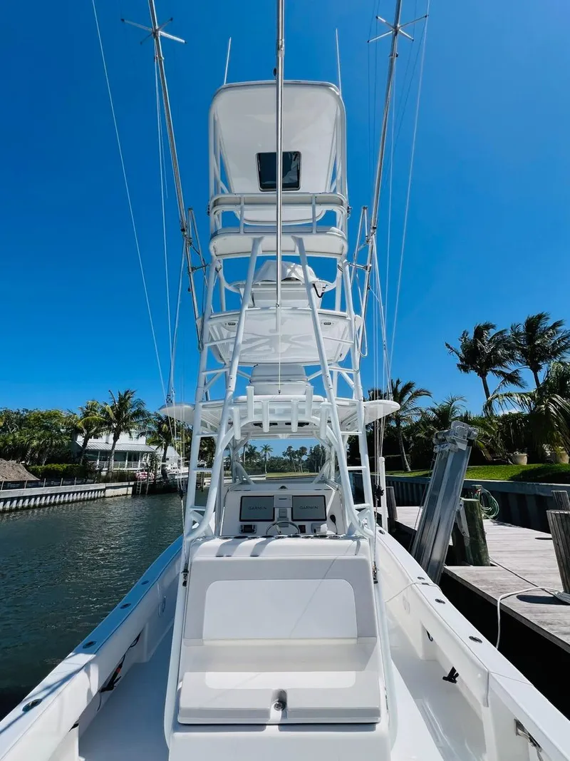 Slide: The Image of 2015 Billfish 39 Custom CC boat docked under clear blue sky. - 43