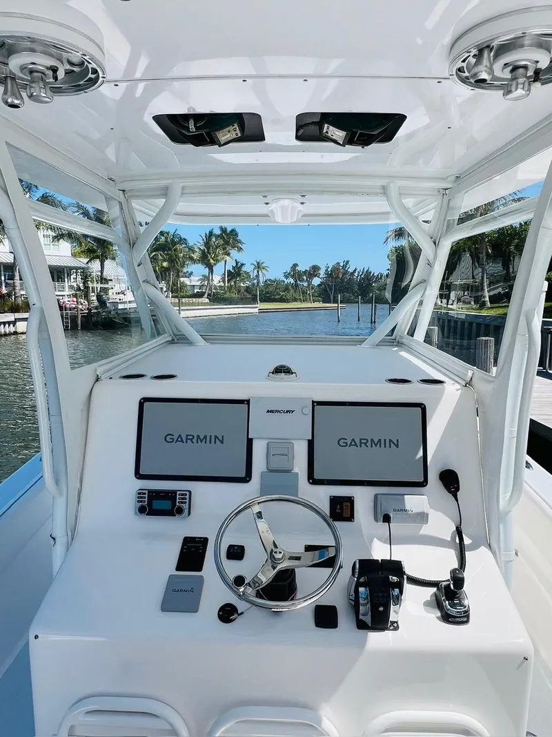 Slide: The Image of 2015 Billfish 39 Custom CC boat helm with Garmin navigation system. - 46