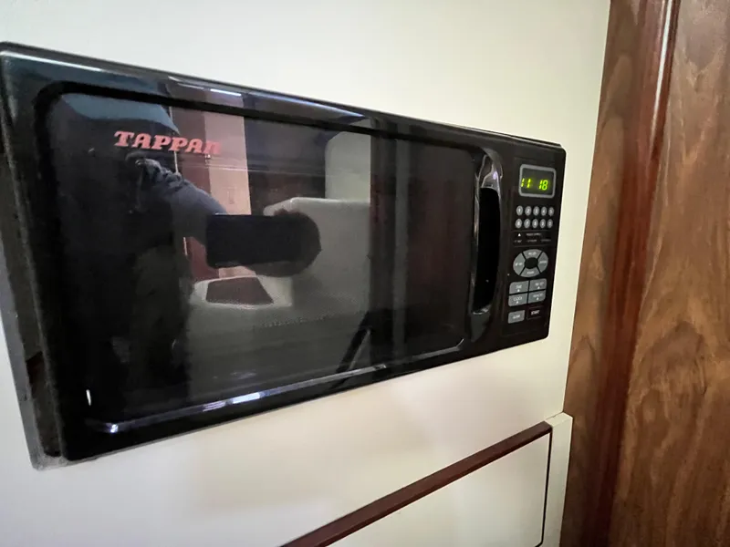 Slide: The Image of Built-in Tappan microwave in 2005 Hunter 31 yacht interior. - 14