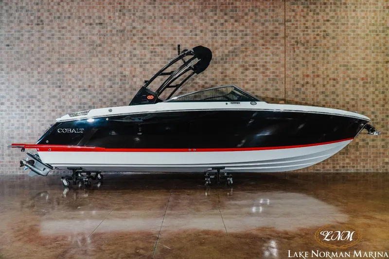 Slide: The Image of 2023 Cobalt R8 boat displayed at Lake Norman Marina. - 1