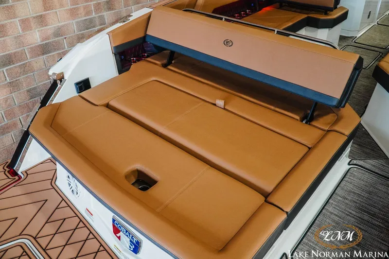 Slide: The Image of 2023 Cobalt R8 boat with tan leather seating at Lake Norman Marina. - 7