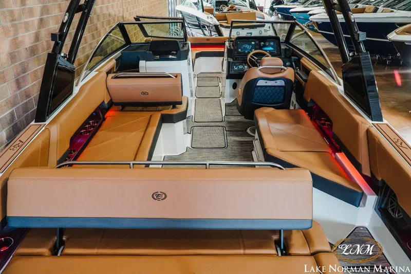 Slide: The Image of 2023 Cobalt R8 boat interior with tan leather seats at Lake Norman Marina. - 8