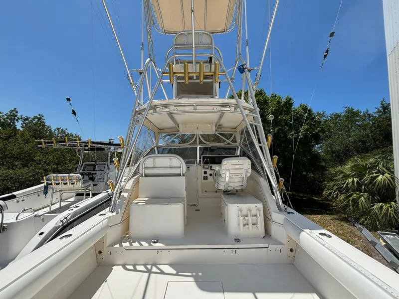 Slide: The Image of 2002 Albemarle 285 Express Fisherman boat with spacious deck and seating. - 2