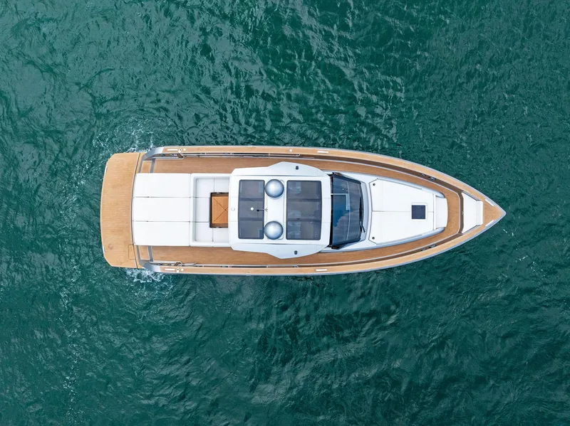Slide: The Image of Aerial view of 2023 Pardo Yachts 50 model cruising on the water. - 10