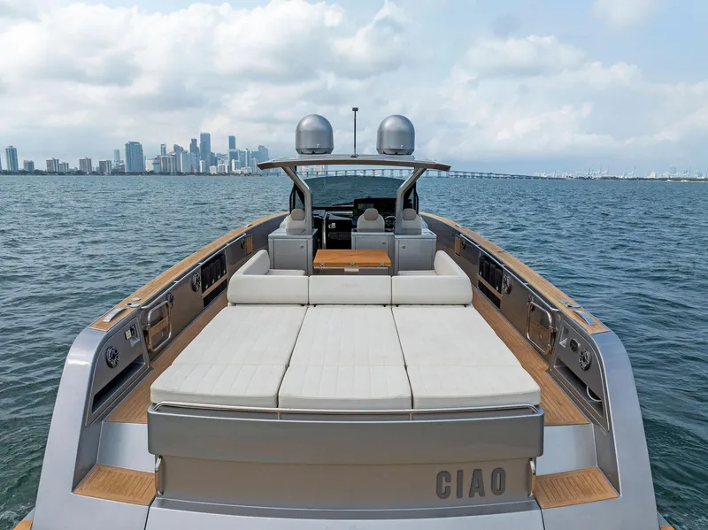 Slide: The Image of 2023 Pardo Yachts 50 luxury yacht with city skyline in the background. - 15