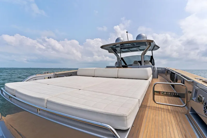 Slide: The Image of 2023 Pardo Yachts 50 luxury yacht with spacious sun deck on open water. - 29